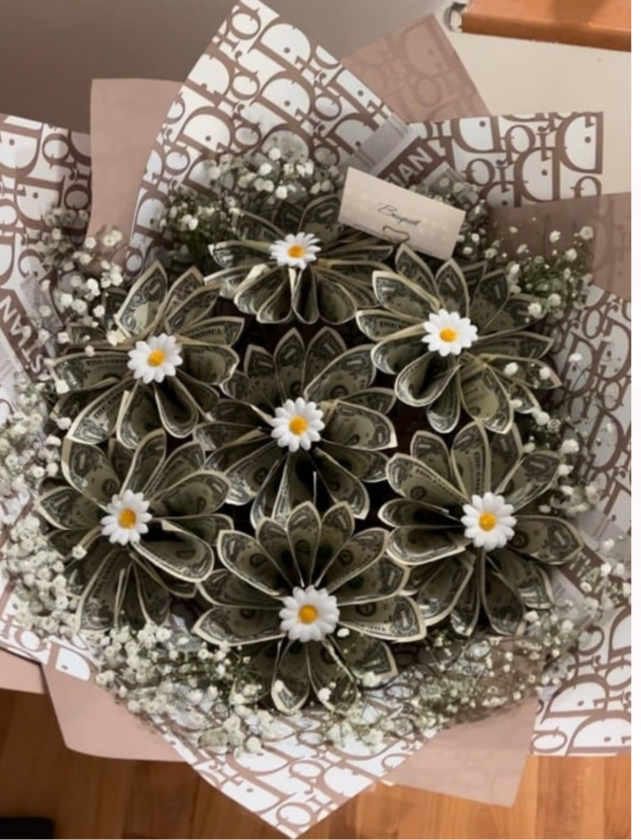 $1 bill Medium daisy bouquet ($50 cash inside )